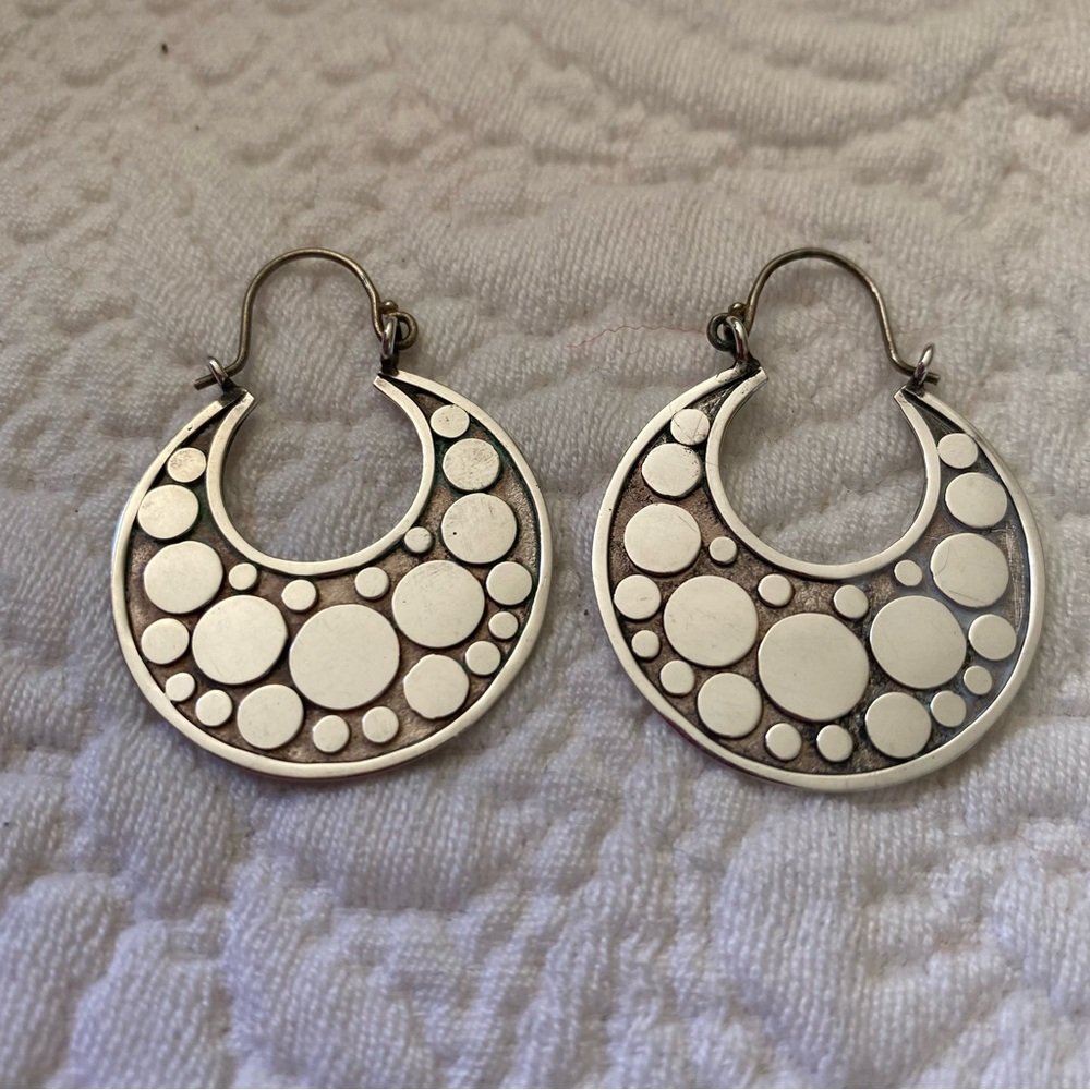 Sterling silver earrings with dot motif.